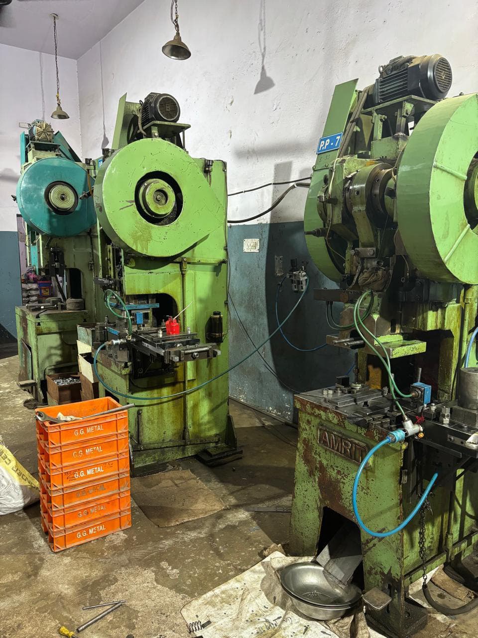 Power presses with G.G Metal crates of finished parts